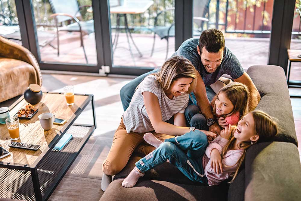 Family playing in living room