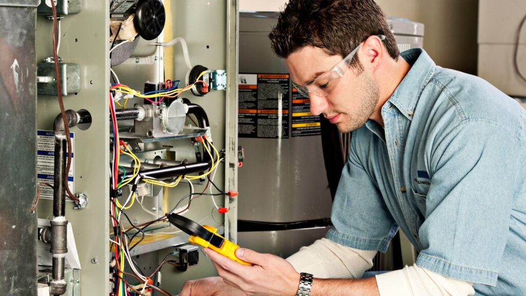 technician checking furnace